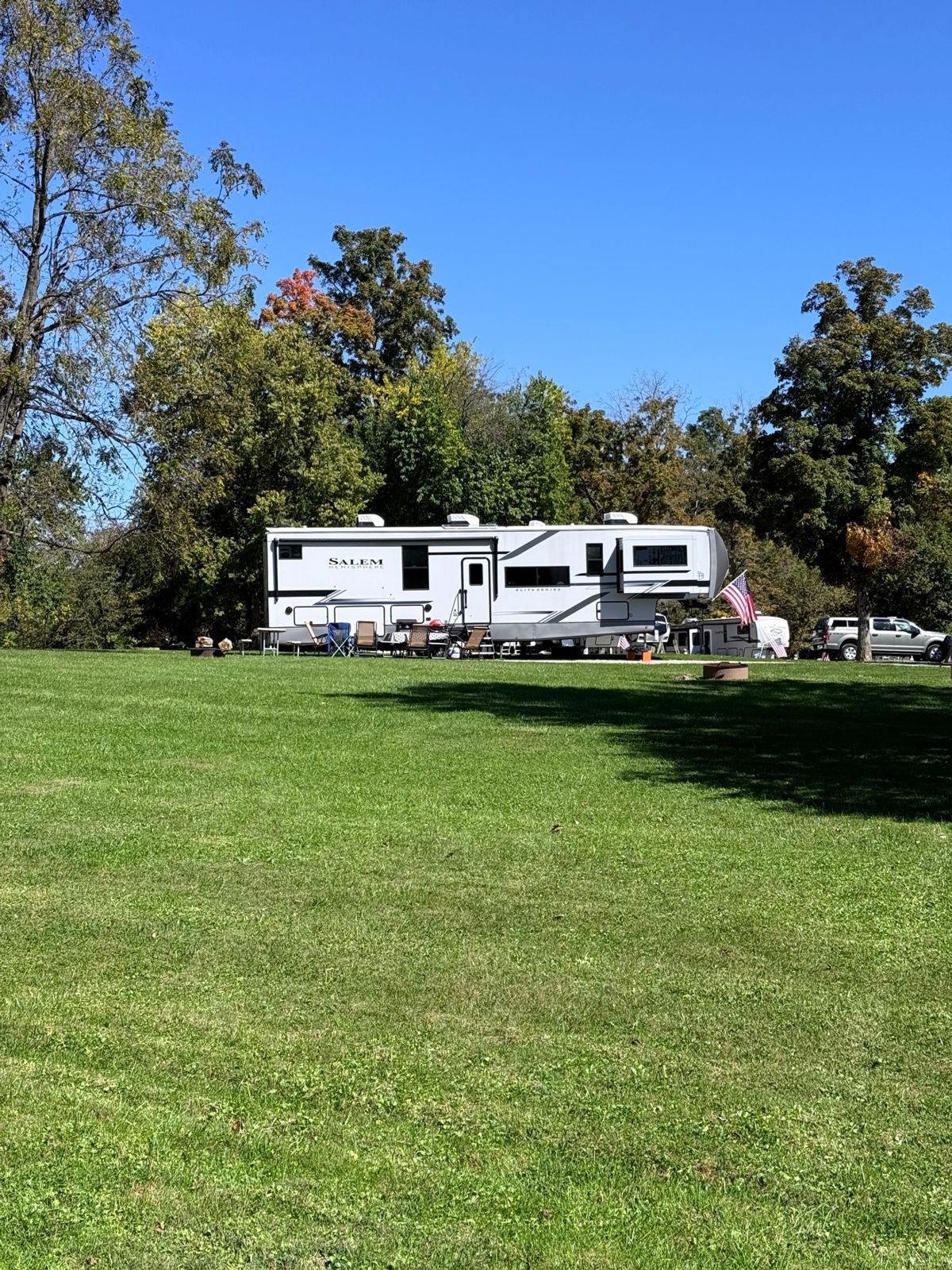 Our fifth wheel set up in a wide open field
